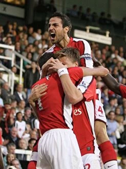 Fulham v Arsenal 2009-10 Collection: Cesc Fabregas celebrates the Arsenal goal score by Robin van Persie