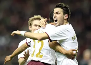 Cesc Fabregas celebrates Arsenals second goal with Theo Walcott