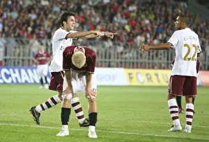 Cesc Fabregas celebrates scoring the 1st Arsenal goal with Gael Clichy