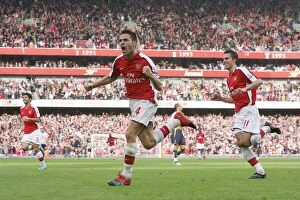 Images Dated 31st October 2009: Cesc Fabregas celebrates scoring the 2nd Arsenal goal