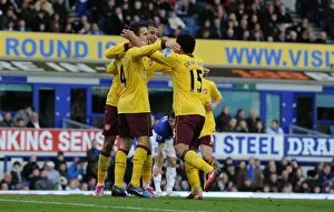 Everton v Arsenal 2010-11 Collection: Cesc Fabregas celebrates scoring the 2nd Arsenal goal with Marouane Chamakh and Denilson