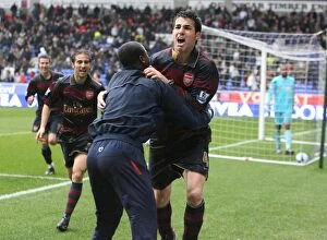 Images Dated 31st March 2008: Cesc Fabregas celebrates scoring the 3rd Arsenal goal with Emmanuel Eboue