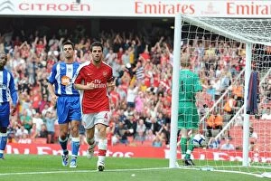 Arsenal v Wigan Athletic 2009-10 Collection: Cesc Fabregas celebrates scoring the 4th Arsenal goal