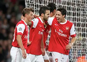 Cesc Fabregas celebrates scoring Arsenal and his 1st goal with Andrey Arshavin