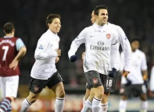 Burnley v Arsenal 2009-10 Collection: Cesc Fabregas celebrates scoring the Arsenal goal with Samir Nasri and Mikael Silvestre