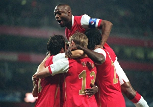 Alex Hleb and Cesc Fabregas celebrate the 1st Arsenal goal scored by Emmanuel Adebayor