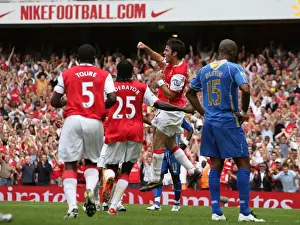 Cesc Fabregas celebrates scoring Arsenals 2nd goal