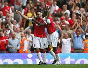 Images Dated 22nd September 2007: Cesc Fabregas celebrates scoring Arsenals 4th goal with Kolo Toure