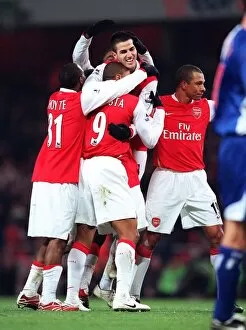 Images Dated 23rd December 2006: Cesc Fabregas celebrates setting up Arsenals 6th goal with Julio Baptista