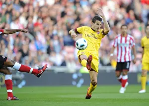 Sunderland v Arsenal 2010-11 Collection: Cesc Fabregas deflects Anton Ferdinands clearance to score the Arsenal goal