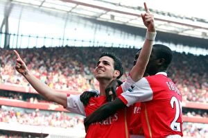 Images Dated 14th April 2007: Cesc Fabregas and Emmanuel Eboue: Arsenal's Unstoppable Duo Celebrate Goal Against Bolton Wanderers