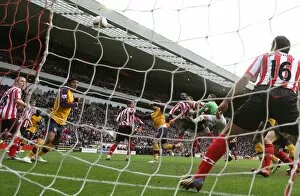 Cesc Fabregas heads past Sunderland goalkeeper Craig