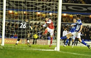 Images Dated 1st January 2011: Cesc Fabregas looks on as his shot is put inot his own net by Birmingham defender Roger Johnson