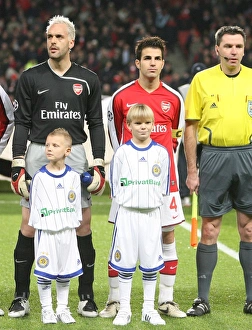 Cesc Fabregas and Manuel Almunia (Arsenal) line up before the match