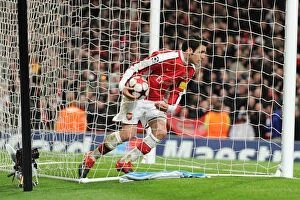 Arsenal v Barcelona 2009-10 Collection: Cesc Fabregas picks up the matchball after scoring the 2nd Arsenal goal