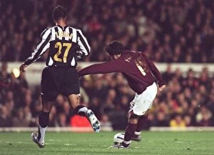 Arsenal v Juventus 2005-6 Gallery: Cesc Fabregas scores Arsenals 1st goal under pressure from Jonathan Zebina (Juve)