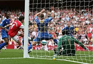 Cesc Fabregas scores Arsenals 2nd goal past David James (Portsmouth)