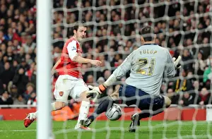 Cesc Fabregas scores Arsenals 3rd goal past Marton Fulop (Ipswich)