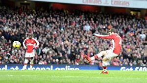 Arsenal v Aston Villa 2009-10 Collection: Cesc Fabregas shoots past Aston Villa goalkeeper Brad Friedel to score the 1st Arsenal goal