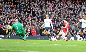 Arsenal v Aston Villa 2009-10 Collection: Cesc Fabregas shoots past Aston Villa goalkeeper Brad Friedel to score the 2nd Arsenal goal