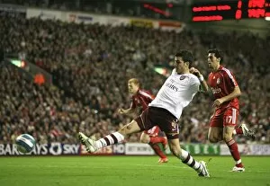 Liverpool v Arsenal 2007-8 Collection: Cesc Fabregas shoots past Liverpool goalkeeper Jose Reine to score the Arsenal goal