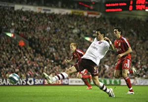 Liverpool v Arsenal 2007-8 Collection: Cesc Fabregas shoots past Liverpool goalkeeper Jose Reine to score the Arsenal goal