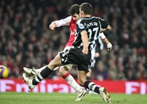 Images Dated 29th January 2008: Cesc Fabregas shoots past Shay Given to score the 3rd Arsenal goal