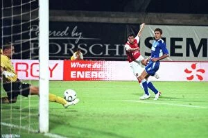 Images Dated 10th August 2006: Cesc Fabregas shoots past Zagreb goalkeeper Ivan Turina to score the 1st Arsenal goal