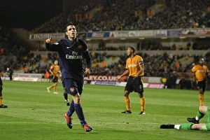 Fabregas Cesc Collection: Cesc Fabregas Triumphant Goal: Arsenal Crushes Wolves 4-1 in Premier League