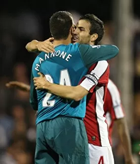 Mannone Vito Collection: Cesc Fabregas and Vito Mannone (Arsenal) at the end of the match
