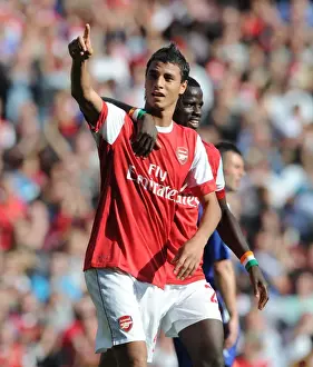 Chamakh and Eboue: Arsenal's Unstoppable Duo Celebrates 4-1 Victory Over Blackburn Rovers