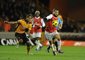 Wolverhampton Wanderers v Arsenal 2010-11 Collection: Chamakh and Mancienne Clash: Arsenal's Duo Secures 2-0 Win Over Wolverhampton