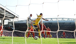 Liverpool V Arsenal 2010-11 Prints: Chamakh vs. Reina: Aerial Battle in the 1-1 Liverpool vs. Arsenal Stalemate