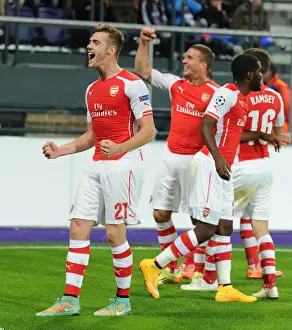 Chambers and Podolski Celebrate Arsenal's Goals in Anderlecht Victory, UEFA Champions League 2014-15