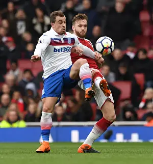 Chambers Under Pressure: Shaqiri Challenges Arsenal's Defender