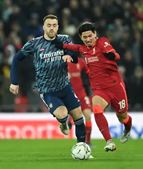 Chambers vs Minamino: Intense Battle in Carabao Cup Semi-Final First Leg between Liverpool and Arsenal