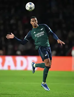 PSV Eindoven V Arsenal 2023-24 Prints: Champions League: Arsenal's Gabriel Magalhaes Faces Off Against PSV Eindhoven in Group B Showdown
