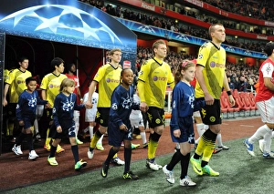 Champions League Clash: Arsenal FC vs. Borussia Dortmund - Player Escorts (2011-12)