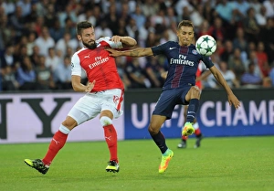 Paris Saint Gernain V Arsenal 2016-17 Prints: Champions League Clash: Giroud vs. Marquinhos - Paris Saint-Germain vs. Arsenal (2016-17)
