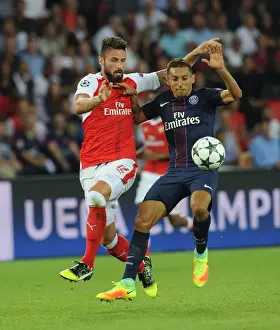 Paris Saint Gernain V Arsenal 2016-17 Prints: Champions League Clash: Giroud vs Marquinhos - Paris Saint-Germain vs Arsenal (2016-17)