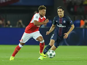Paris Saint Gernain V Arsenal 2016-17 Prints: Champions League Clash: Oxlade-Chamberlain vs Cavani - Arsenal vs Paris Saint-Germain (2016-17)