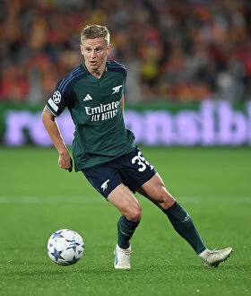 RC Lens v Arsenal 2023-24 Collection: Champions League Group B: Oleksandr Zinchenko in Action for Arsenal against RC Lens