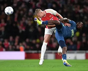 Arsenal V PSV Eindhoven 2023-24 Prints: Champions League Showdown: Arsenal vs PSV Eindhoven - A Head-to-Head Battle between Zinchenko and Bakayoko