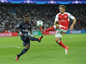 Paris Saint Gernain v Arsenal 2016-17 Collection: Champions League Showdown: A Clash of Titans - Paris Saint-Germain vs. Arsenal