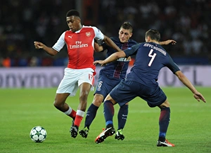 Paris Saint Gernain V Arsenal 2016-17 Prints: Champions League Showdown: Iwobi vs