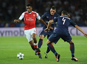 Paris Saint Gernain V Arsenal 2016-17 Prints: Champions League Showdown: Iwobi vs