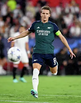 Champions League Showdown: Odegaard's Arsenal Warm-Up at Sevilla's Stadium (2023-24)