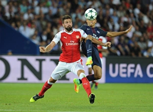 Paris Saint Gernain V Arsenal 2016-17 Prints: Champions League Showdown: Olivier Giroud vs