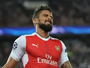 Paris Saint Gernain V Arsenal 2016-17 Prints: Champions League Showdown: Olivier Giroud's Action-Packed Battle between Paris Saint-Germain and Arsenal