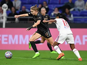 Olympic Lyonnais V Arsenal Women 2022-23 Prints: Champions League Showdown: Olympique Lyonnais vs. Arsenal Women - Miedema Takes On Sombath